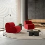 Modernes, minimalistisches Wohnzimmerdesign mit zwei roten, herzförmigen Designer-Modulsesseln.