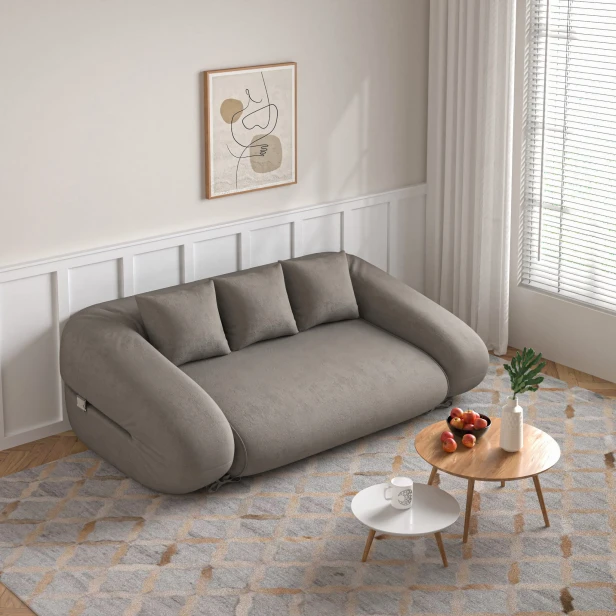 Sofa mit Schlaffunktion, klappbar, für die Aufstellung im Wohnzimmer.