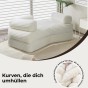 Ein Sofa mit einer weichen Entspannungszone, Kurven, die umarmen.