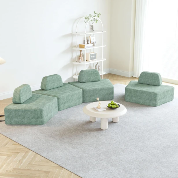 Set aus vier modularen, halbrunden Ecksofas, angeordnet im Wohnzimmer.