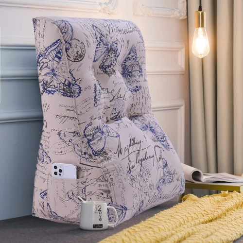 Vielseitiges Lesekissen mit Schmetterlingsmuster, zur Platzierung im Schlafzimmer auf dem Bett.