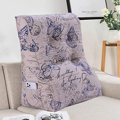 Vielseitiges Lesekissen mit Schmetterlingsmuster, arrangiert im Wohnzimmer.